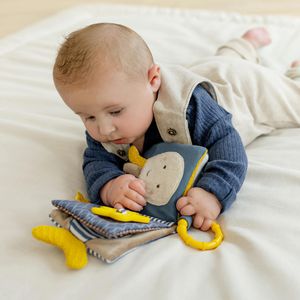 Produktbild für Motorikspielzeug Fehn 047110, Stoffbuch Otter