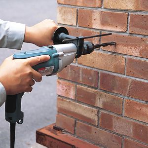 Produktbild für Schlagbohrmaschine Makita HP2051J, Netzbetrieb, 720 W